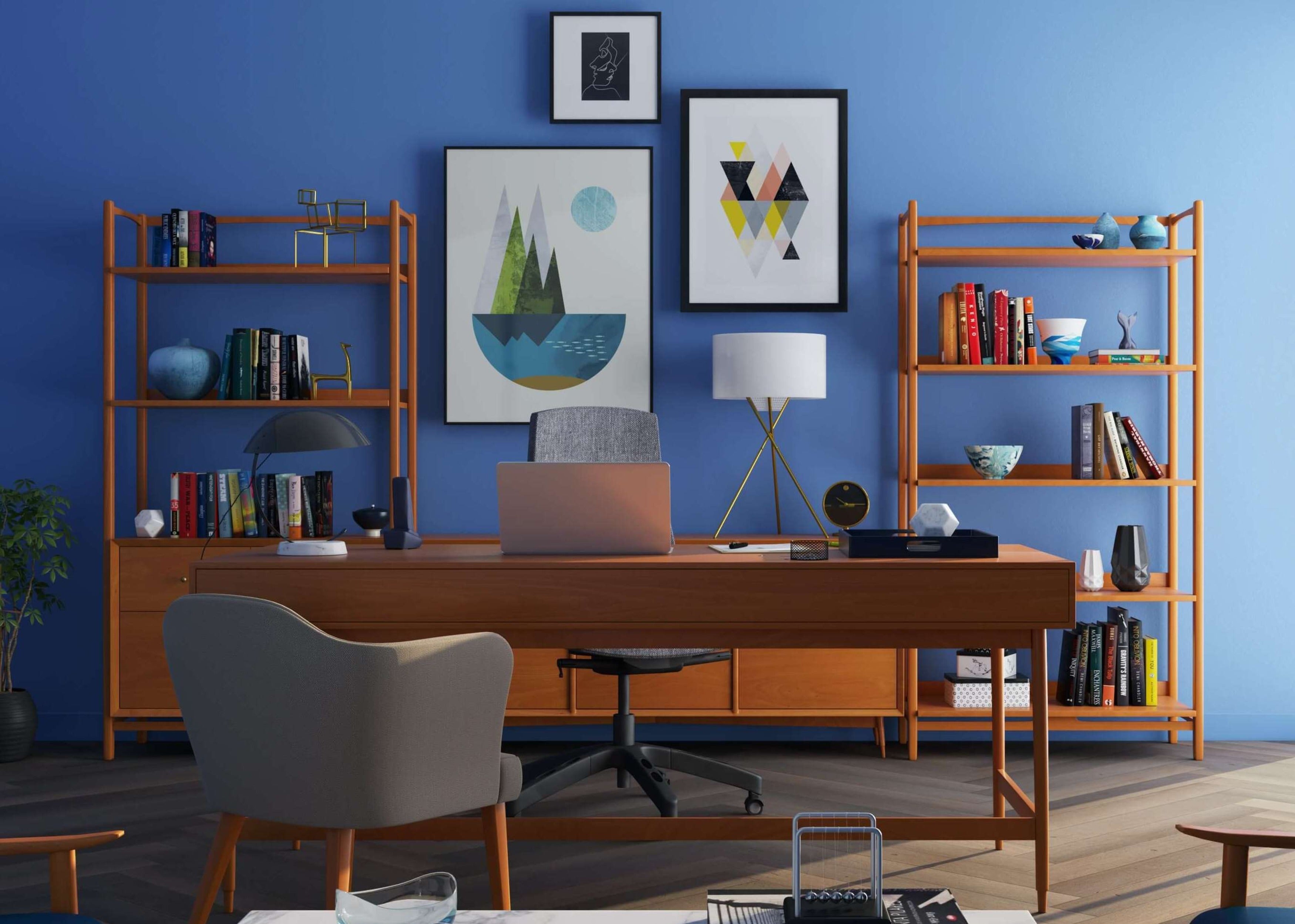 a home office with a large wooden desk and blue background